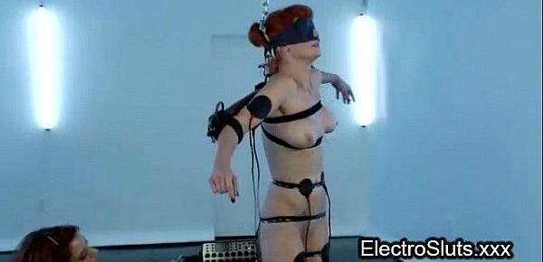  Strapped wired redhead femdom electro shocked